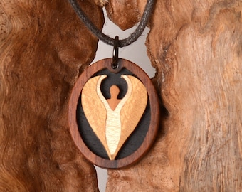 Angel pendant necklace. Wooden jewelry. The colors of five different sorts of noble wood. Handmade in Germany. No laser jewelry.