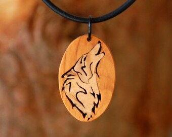 Howling Wolf pendant. Wooden jewelry. Fine fretsaw work. No laser, no pyrography. Intarsia veneer work.