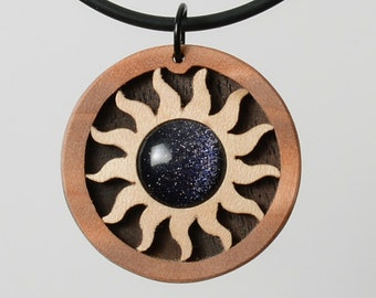 Goldstone pendant. Wooden jewelry. Selectable length of the necklace. Handicraft from Germany.