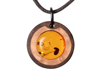 Amber noble wood pendant. Wooden jewelry. Choice of necklace length. No laser jewelry. Made in Germany.