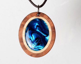 Paua Abalone. Large mother-of-pearl pendant made of precious wood. Necklace length can be selected. Handmade in Germany.