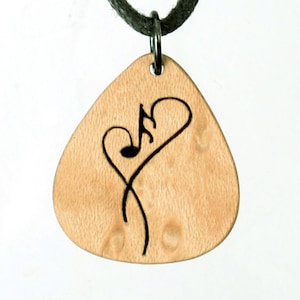Wooden jewelry with music and soul. Lovely pendant for musicians and music teachers. Handmade in Germany