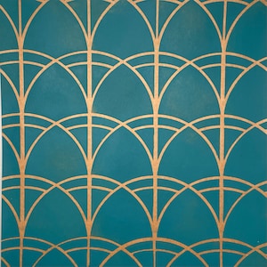 May include: Teal blue background with a repeating pattern of gold arches. The arches are arranged in a grid pattern, creating a geometric design.