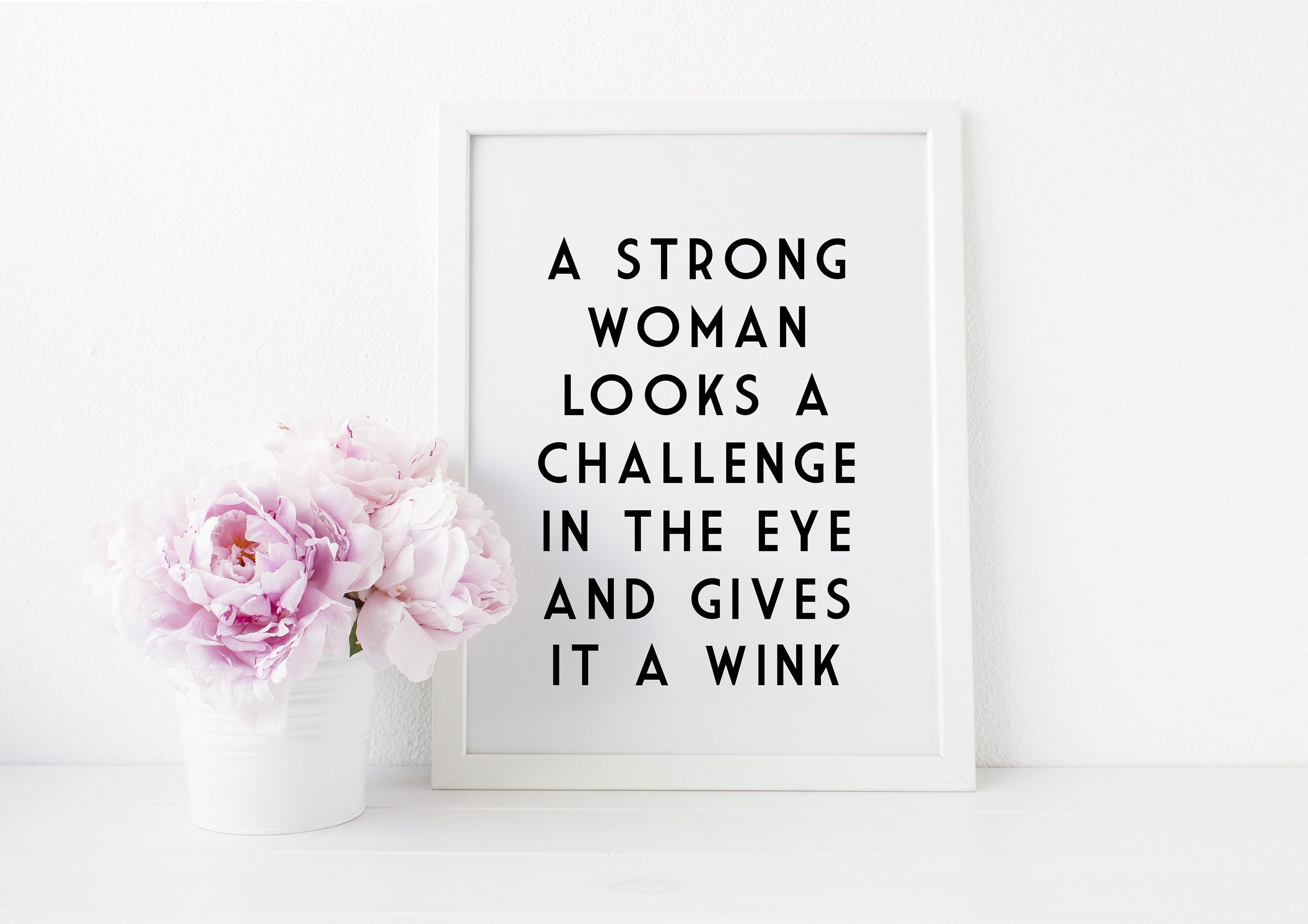 6. "A strong woman looks a challenge in the eye and gives it a wink" - wide 2