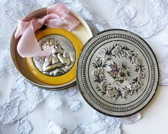 Antique Silvered Medal Guardian Angel Signed L. De Helly, French Crib Medal after Raphael Angel in its original embossed presentation box.