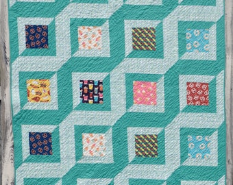 Twirled Squares Quilt Pattern