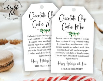 May include: Two white gift tags with green holly sprigs and red berries. The tags have instructions for making chocolate chip cookies. The text on the tags reads "Chocolate Chip Cookie Mix" and "Happy Holidays with Love, The Smith Family".