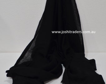May include: A black fabric scarf with a frayed edge. The scarf is draped over a white surface. The text "www.joshitraders.com.au" is visible in the bottom right corner of the image.