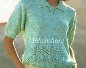 May include: A light green knitted sweater with a collared neckline and short sleeves. The sweater has a lace pattern at the bottom.
