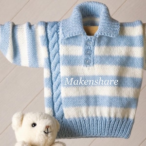 May include: A long-sleeved knit sweater featuring horizontal light blue and white stripes, a collared neckline with three light blue buttons, and a vertical cable knit pattern on the left side. The word Makenshare is printed on the front.