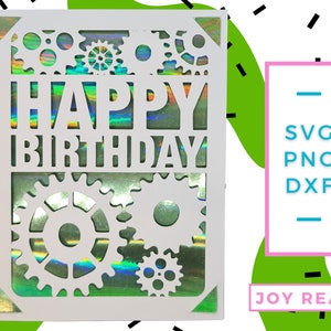 May include: White card with a holographic background and a cut-out design of gears and the words "Happy Birthday".