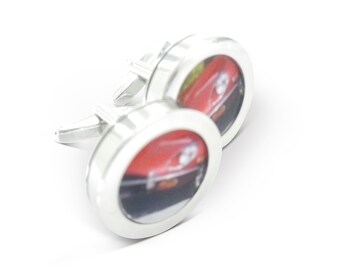Beautiful rich dark royal blue cigar design ceramic cufflink set on high polished stainless steel,swivel shank action,lovely piece.