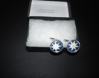 Cream star on deep navy cuff links, , dramatic, elegant present for that certain someone. Ref 3539....now available silver or gold plated