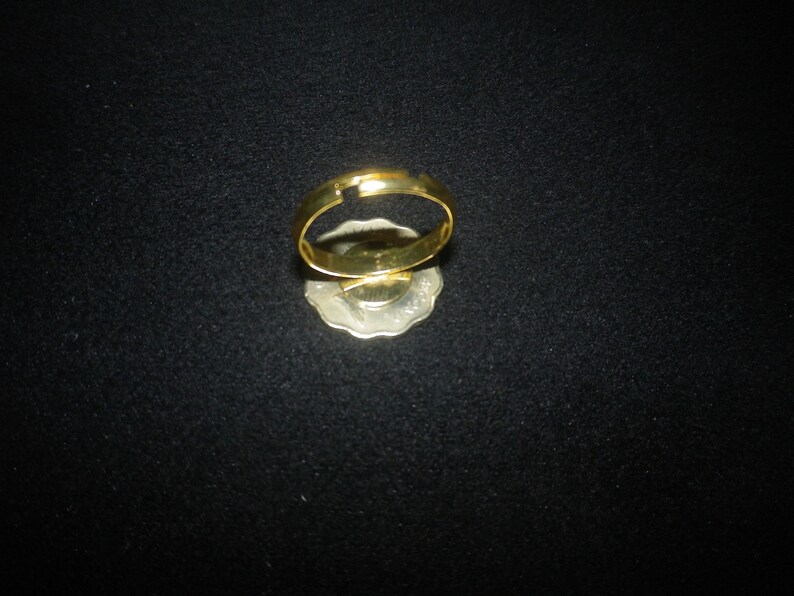 lovely 20th anniversary or birthday present. Hong Kong 20 cent gold plated adjustable ring