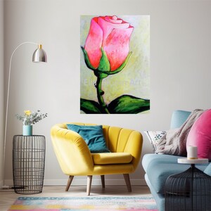 May include: A painting of a single pink rose with green leaves and a yellow background. The painting is signed "Ella Bloom Art".