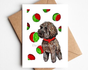 Cockerpoo greeting card, chocolate cockerpoo card, cockerpoo dog card, red heart collar, cockerpoo set against a background of tennis balls