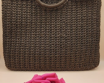 Hand-made designer crochet handbag made in Peru. Brown cotton-nylon cord.