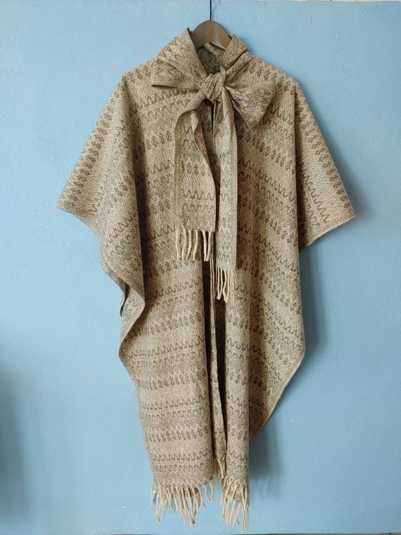 Gray and beige wool poncho with bow and fringes. long wool cape with buttons and tie. vintage mexican poncho in bohemian style. present