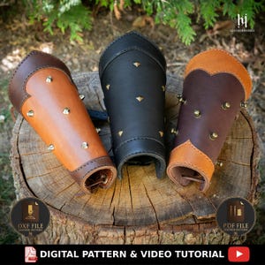 May include: Three leather bracers in tan, black, and dark brown, each featuring a pointed top edge and metallic studs. The tan and dark brown bracers have contrasting trim, while the black bracer is solid. Includes text: DXF FILE, PDF FILE.