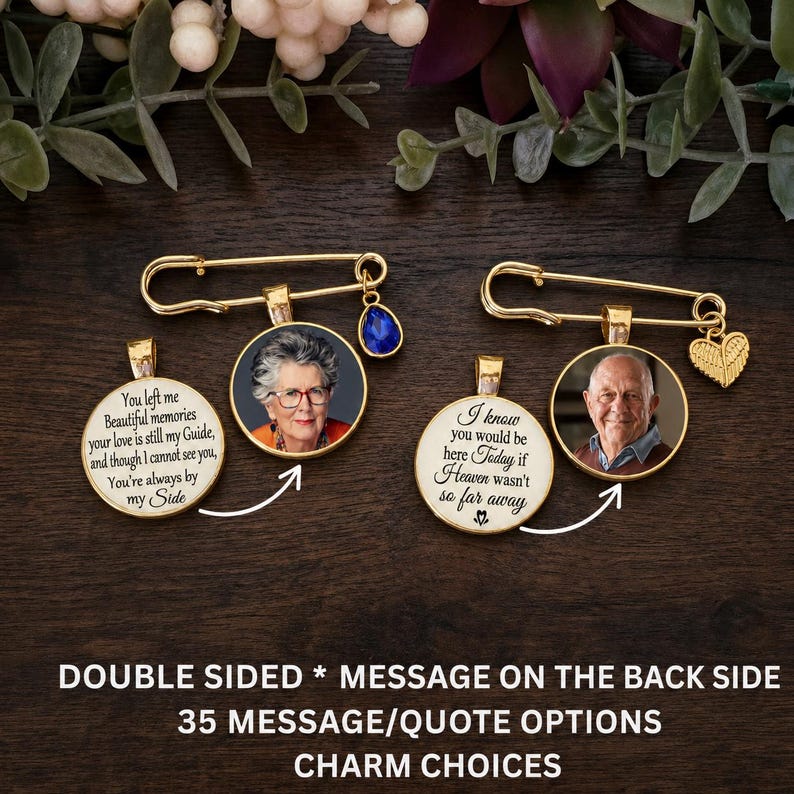 May include: Two gold-tone safety pin brooches featuring circular photo pendants. One pendant shows a woman with glasses, the other a man. Each has a matching circular charm with memorial text. One pin has a blue teardrop charm, the other a gold heart.