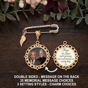 May include: A gold-toned brooch pin featuring a row of clear crystals and a dangling wing charm. Attached is a round, ornate gold-toned pendant displaying a photograph of an older couple. A second matching pendant shows the text: Those we Love don't go away they walk beside us every day.