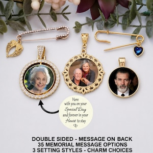 May include: Two gold-toned safety pins, one with a dangling angel wing charm and one with a blue heart charm, alongside three circular photo pendants. The pendants feature portraits of individuals and ornate gold frames. Text reads: Here with you on your Special Day and forever in your Heart to stay. DOUBLE SIDED - MESSAGE ON BACK 35 MEMORIAL MESSAGE OPTIONS 3 SETTING STYLES - CHARM CHOICES