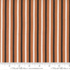 May include: Orange and black striped fabric with a white background. The fabric is shown with a ruler for scale.