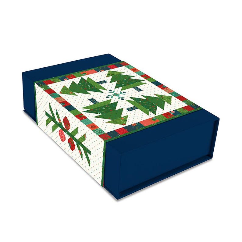 May include: A blue gift box with a white and green patterned lid. The pattern features a patchwork design of Christmas trees and snowflakes.