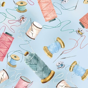 May include: A seamless pattern featuring watercolor illustrations of spools of thread in various colors, including pink, blue, and green. The spools are arranged on a light blue background, with some of the thread trailing off the spools.