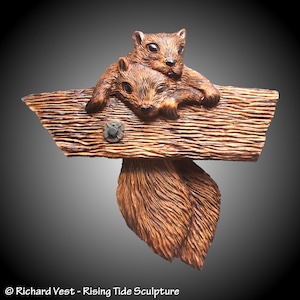 Twin Squirrels Just Hanging Around Wall Carving
