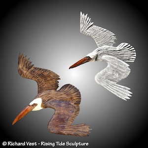 Brown and White Flying Pelicans Wall Carvings