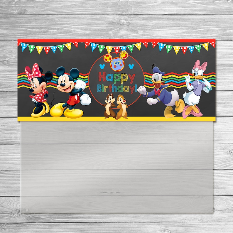 May include: A colorful birthday banner featuring Mickey Mouse, Minnie Mouse, Donald Duck, Daisy Duck, and Chip and Dale. The banner has a black background with the words "Happy Birthday!" in the center, and a red, yellow, and green border.