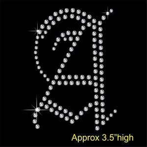 May include: A rhinestone design of the letter "B" in a silver color. The design is approximately 3.5 inches high.
