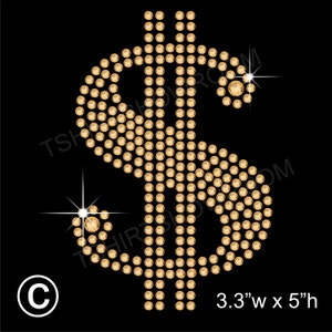 May include: Gold dollar sign made of rhinestones, 3.3 inches wide by 5 inches high.