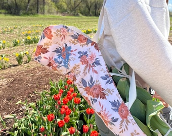 Bolsa con ramo de flores
