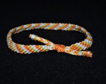 CandyCorn Friendship Bracelet, adjustable, stripe pattern, embroidery floss, white, yellow, orange, square knot slip knot, VioletOpalThreads