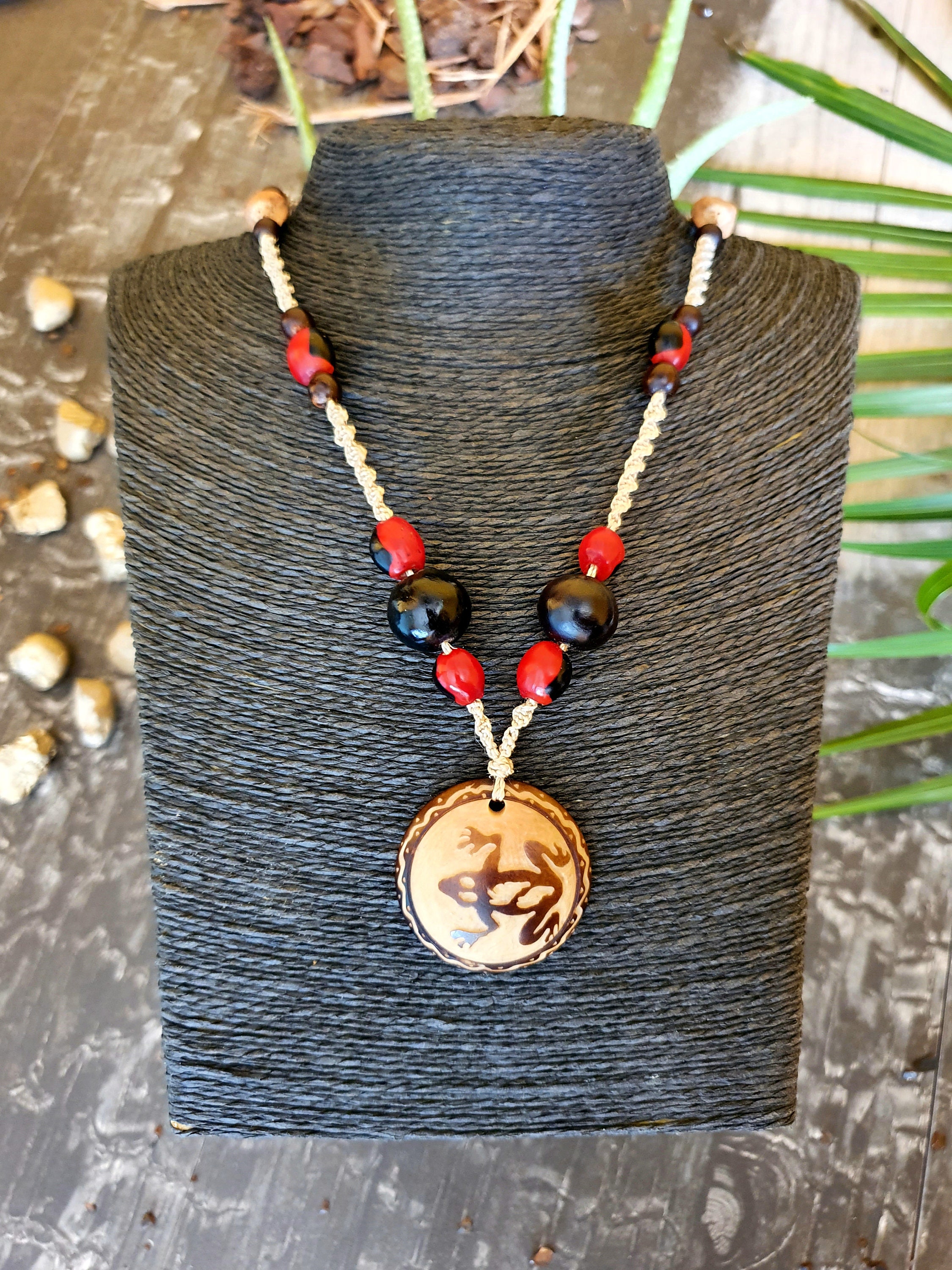 Indigenous made pendant necklace with Huayruro and Tagua Etsy