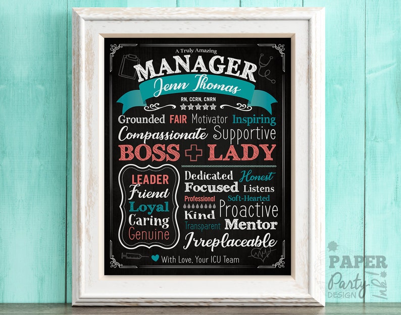 May include: A black chalkboard with white text that reads "A Truly Amazing Manager Jenn Thomas RN, CCRN, CNRN Grounded FAIR Motivator Inspiring Compassionate Supportive BOSS + LADY Dedicated Honest Leader Focused Listens Friend Professional Soft-Hearted Loyal Kind Proactive Caring Transparent Mentor Genuine Irreplaceable With Love, Your ICU Team". The text is in a decorative font and is surrounded by a white border. The chalkboard is framed in a white frame.