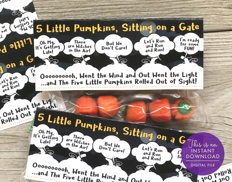 May include: A printable Halloween treat bag with a black and white design featuring the lyrics to the "Five Little Pumpkins" song. The bag is filled with five small orange pumpkin-shaped candies.