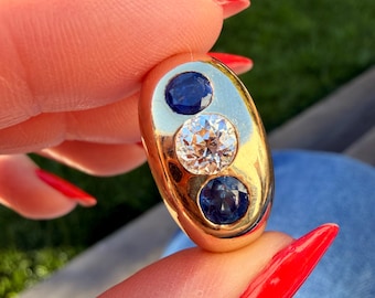 Antique Cartier sapphire and old European cut diamond three stone ring