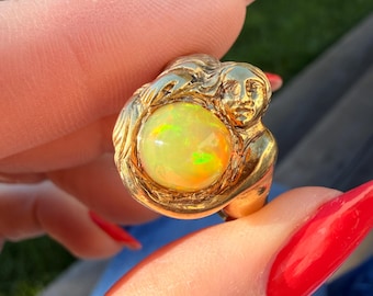 Ethiopian opal set in 14 karat yellow gold