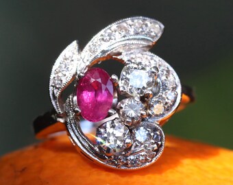 1950s ruby and old European cut diamond cocktail ring set in 14k white gold