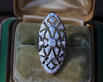 Approximately 1ctw Retro diamond navette ring in 14k white gold size 6.75 (sizable)