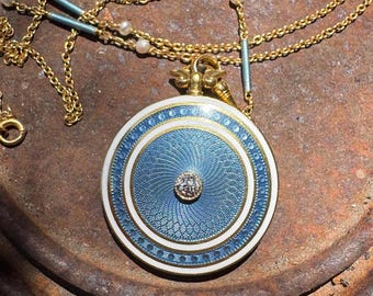 1800s blue Guilloché locket set in 18 karat gold with old European cut diamond on original chain
