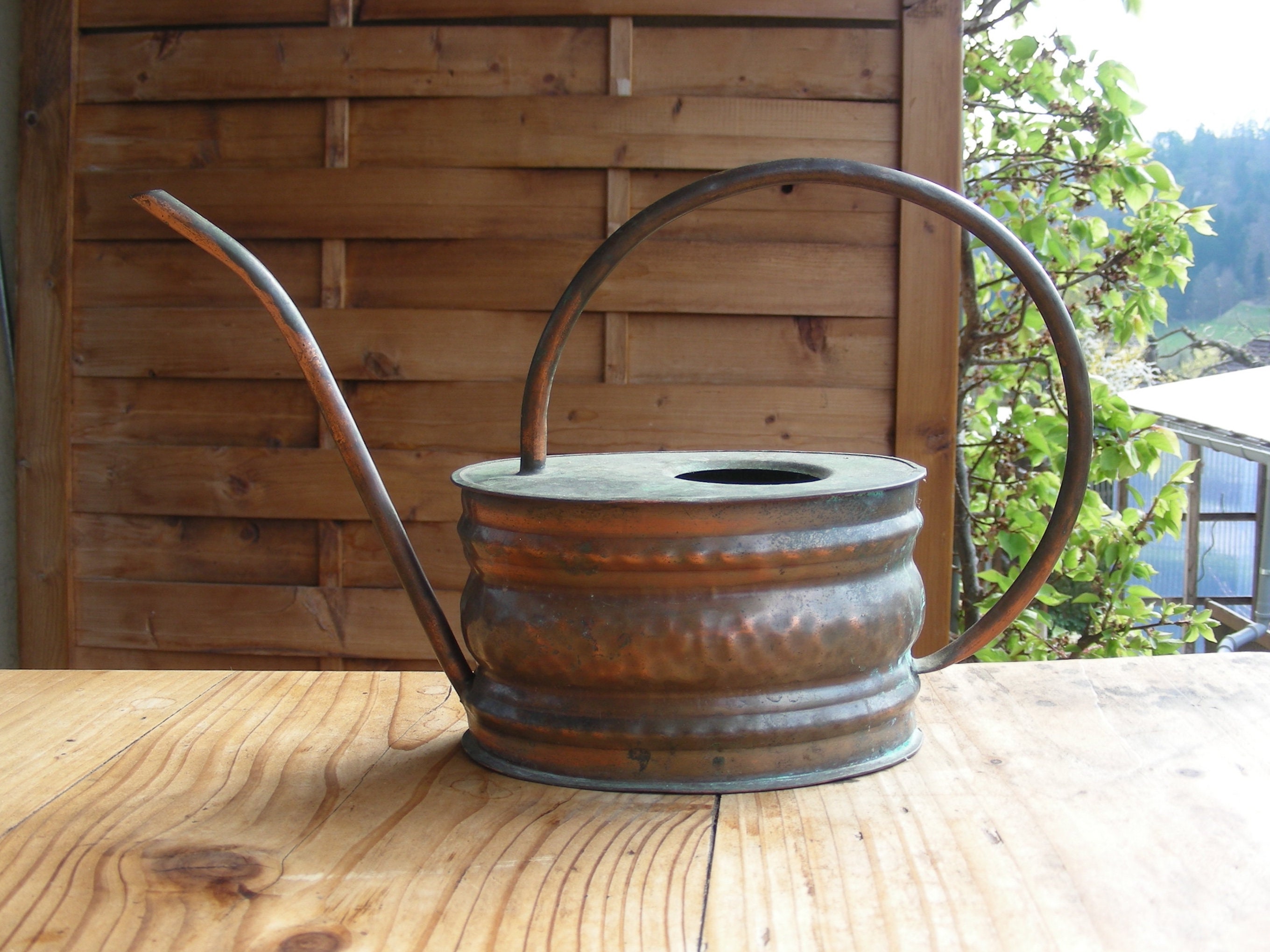 Set of two vintage copper watering cans