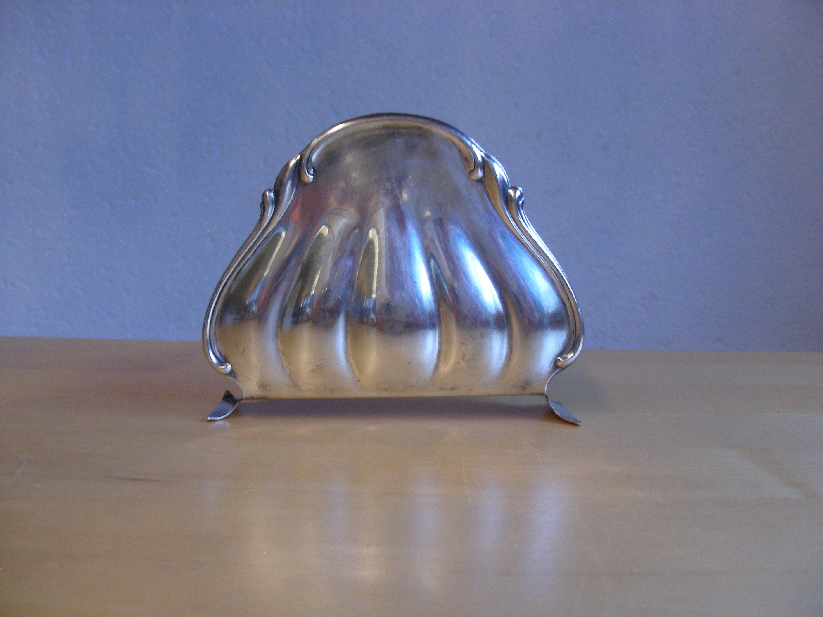 Early 20th century, silver plated napkin holder