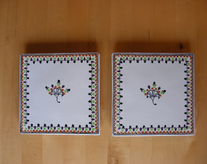 Two ceramic trivets with feet from Schaffhausen Switzerland