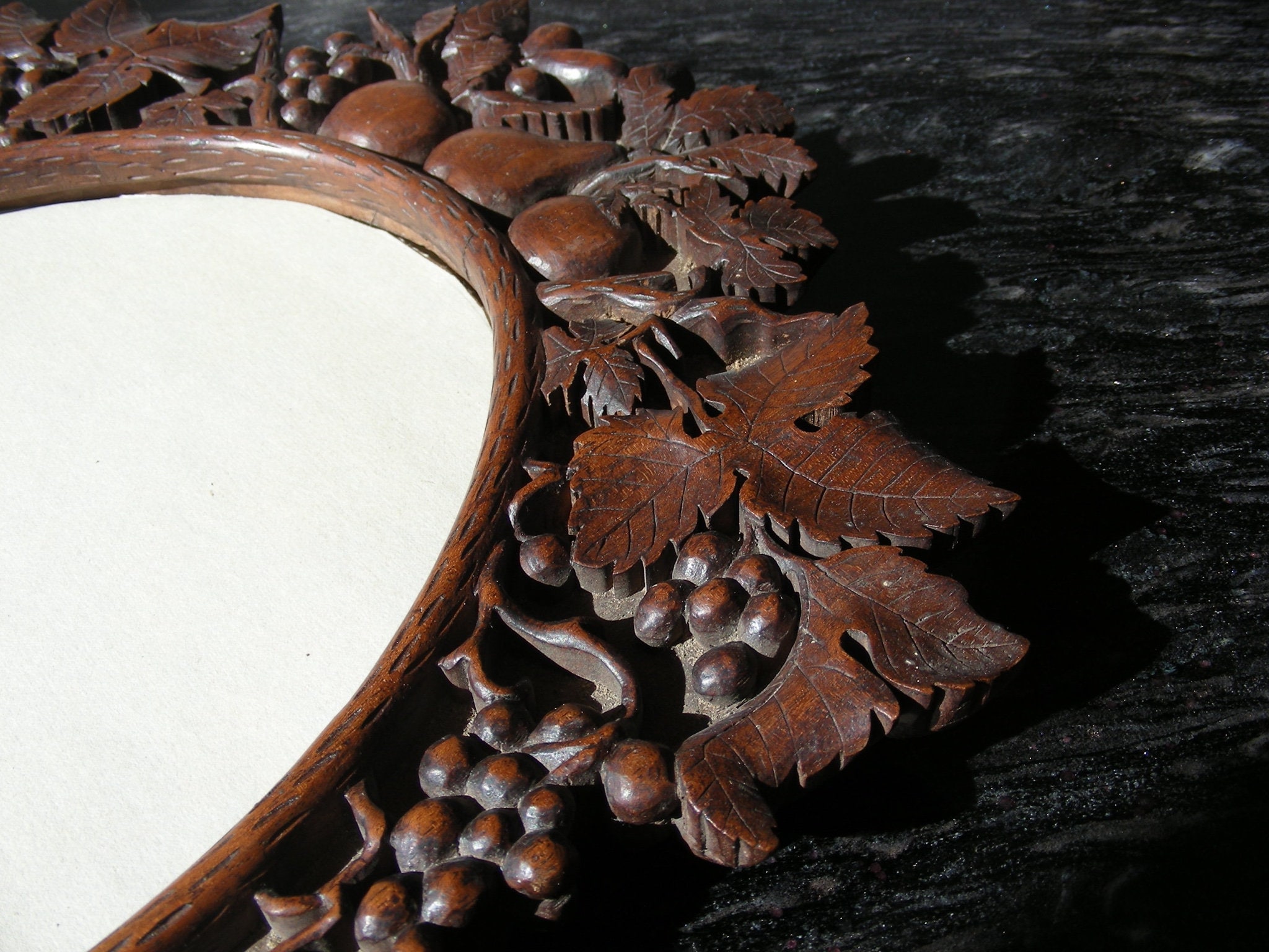 Beautifully carved, vintage, oak, oval mirror or picture frame, grapes and fruit, Brienz Switzerland