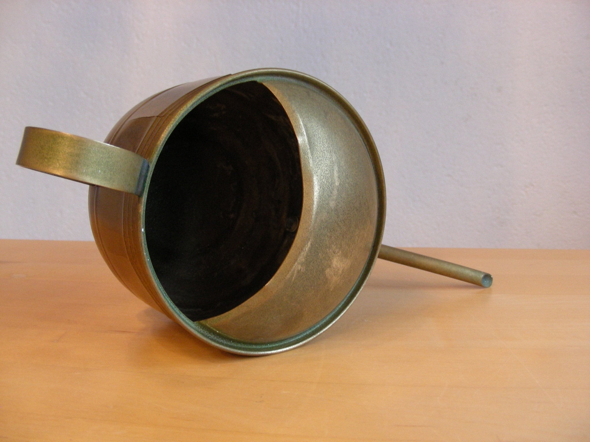 Small, vintage brass watering can