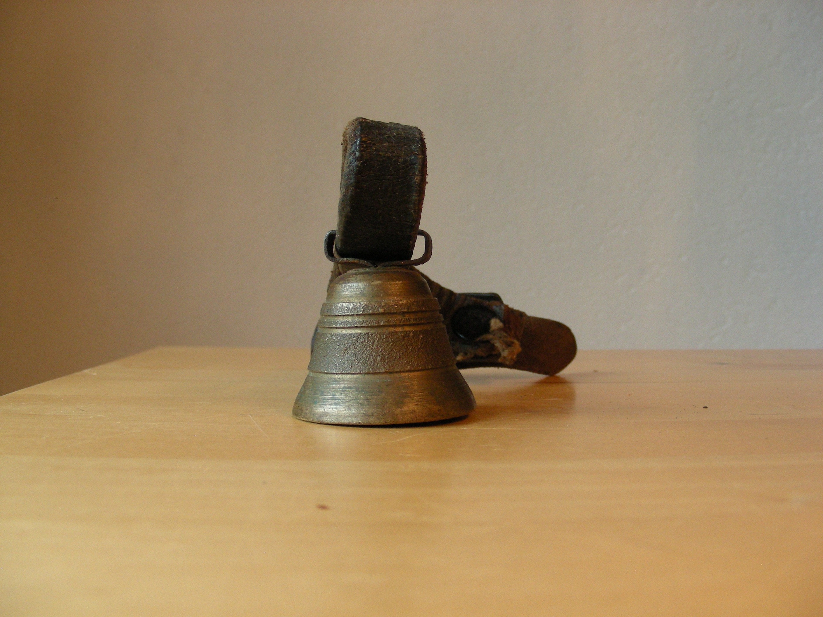 Brass goat bell with leather collar, vintage Swiss bell